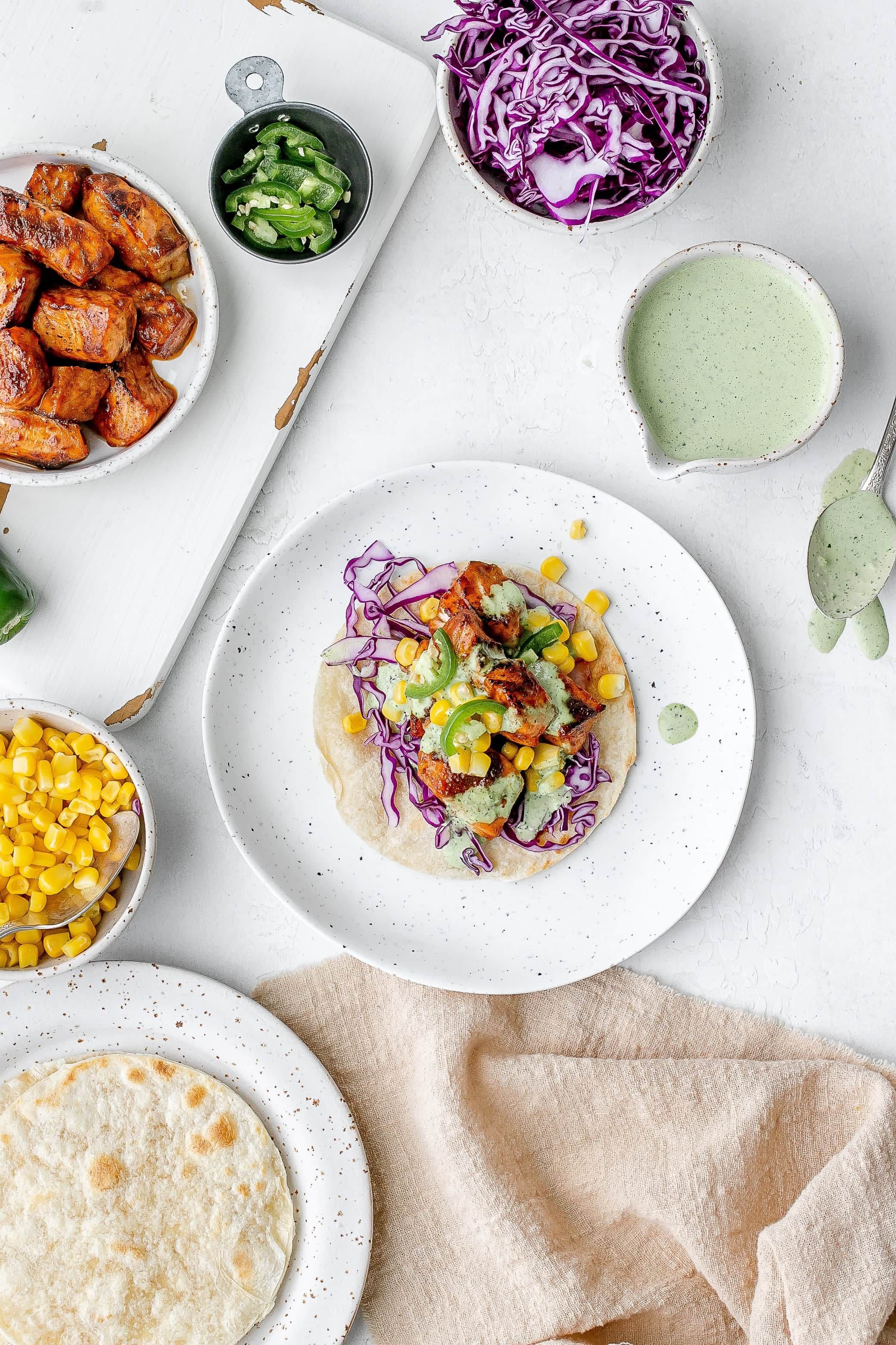 Sheet Pan Salmon Tacos with Green Goddess Sauce